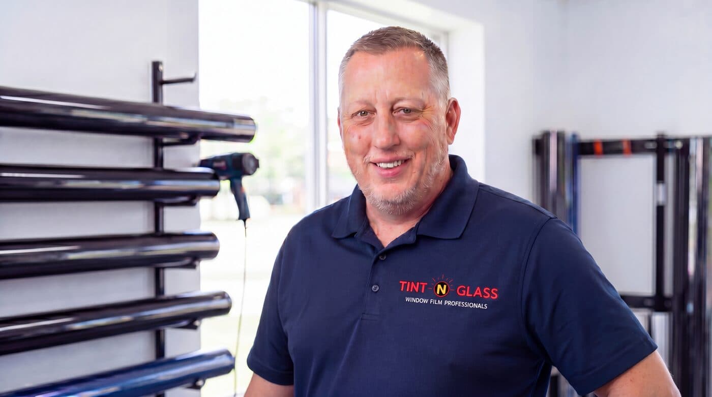 David Taylor portrait inside the Tint N Glass shop
